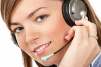 Close-up face of smiling woman in headphones on a white background